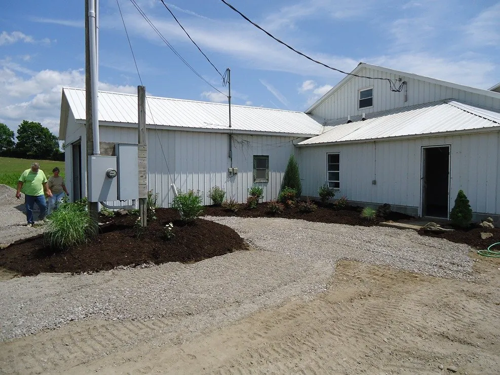 New plantings and gravel at a commercial building